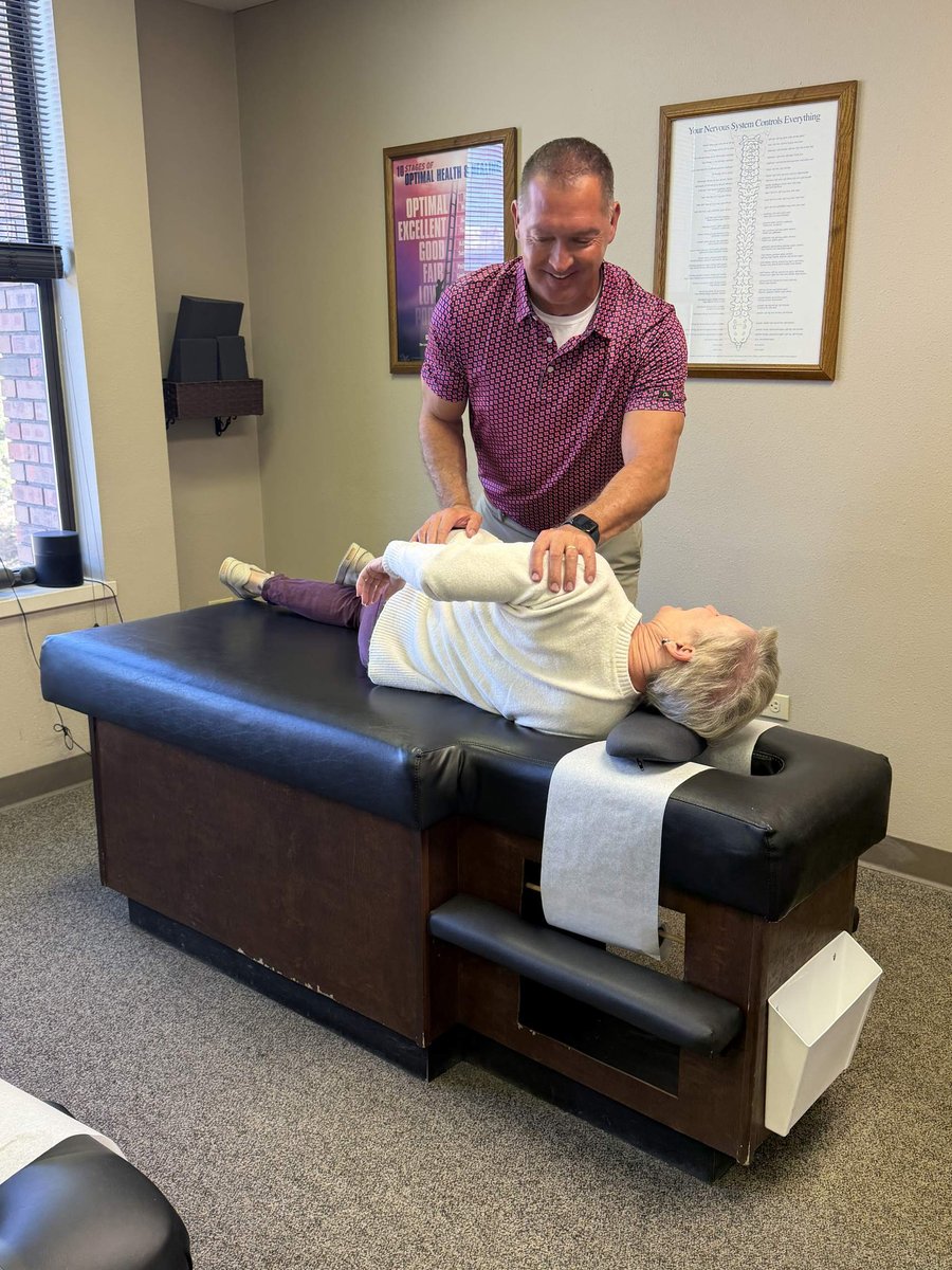 Dr. Aaron Smith providing chiropractic care to a patient at Back to Health Chiropractic in Colorado Springs